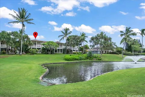a view of a lake and a yard