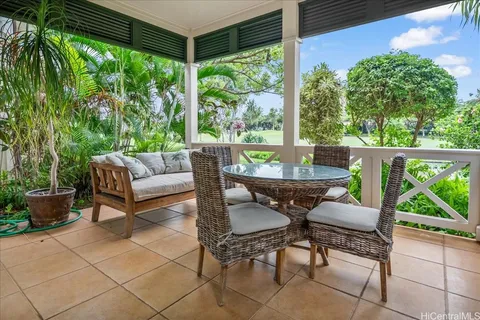 a outdoor living space with furniture and garden view