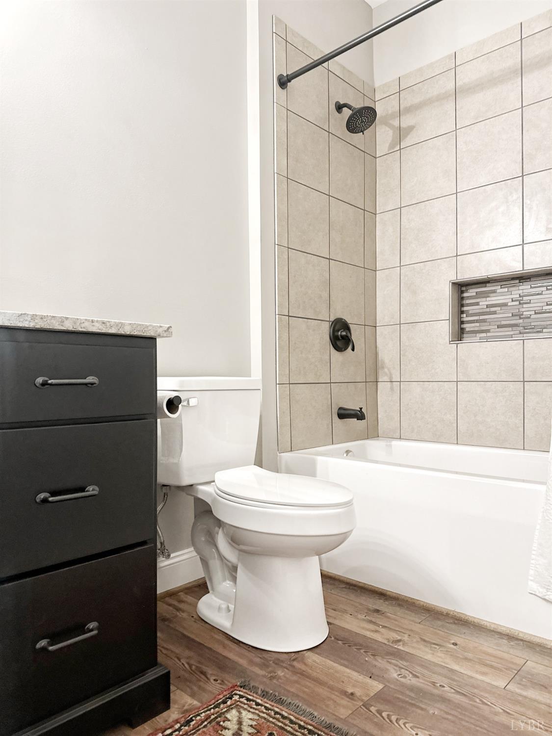 4969 Otterville Road Goode, VA 24556 - Photo 15 of 69 a bathroom with a toilet and a shower