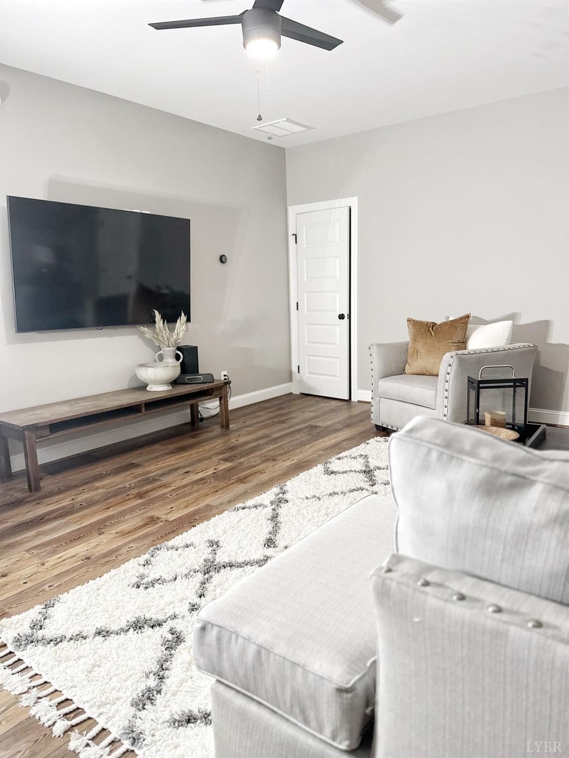 4969 Otterville Road Goode, VA 24556 - Photo 18 of 69 a bedroom with a bed and a television