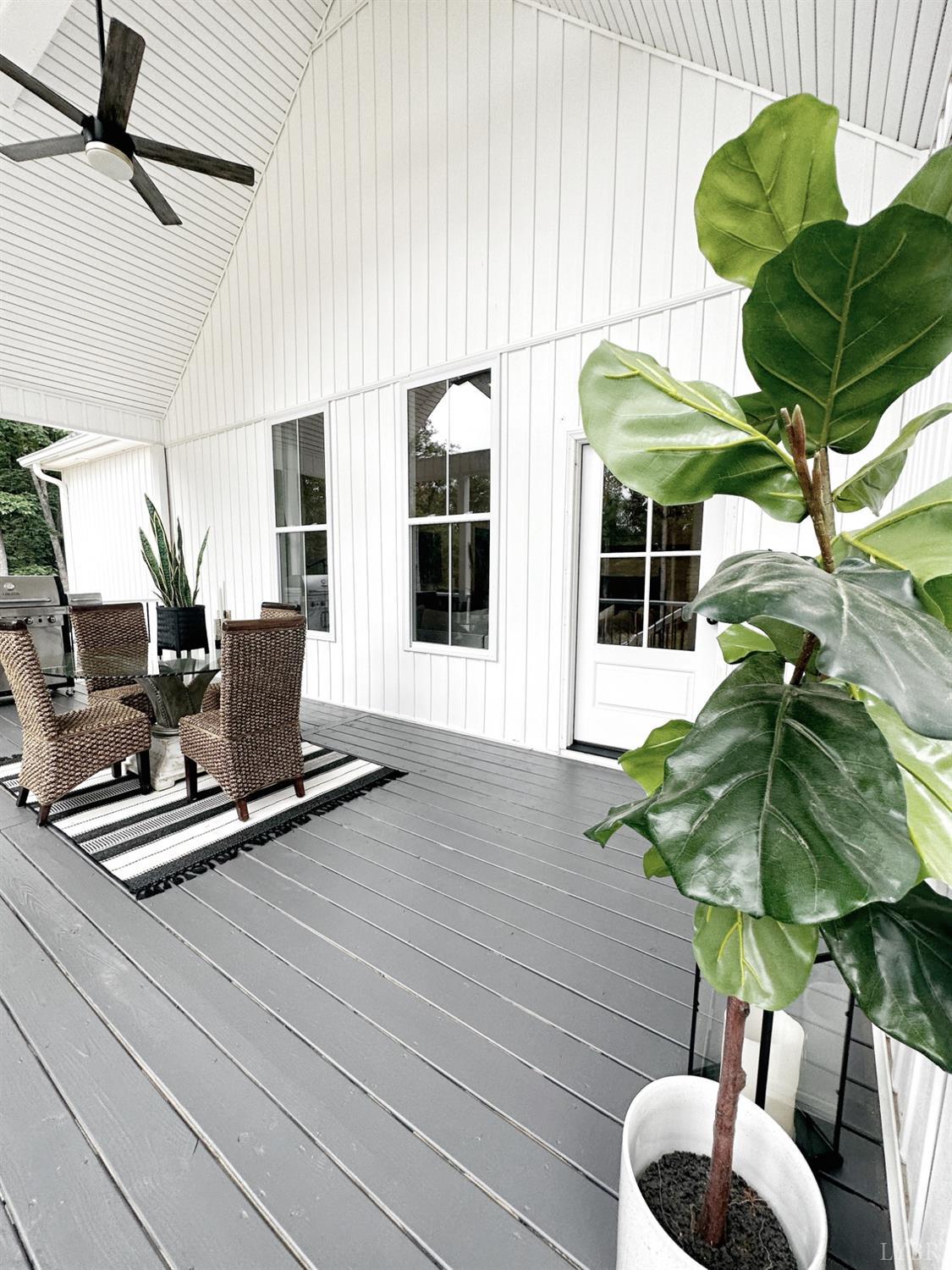 4969 Otterville Road Goode, VA 24556 - Photo 19 of 69 a vase of flowers sitting on a table with window