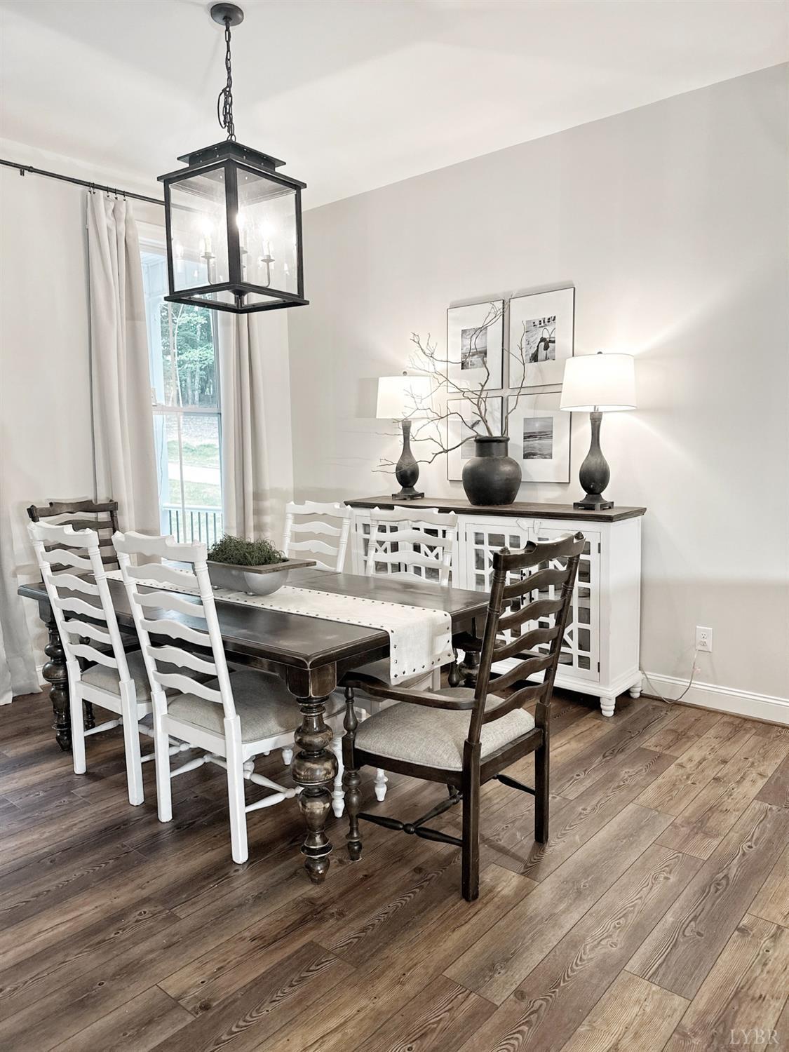 4969 Otterville Road Goode, VA 24556 - Photo 30 of 69 a view of a dining room with furniture window and wooden floor