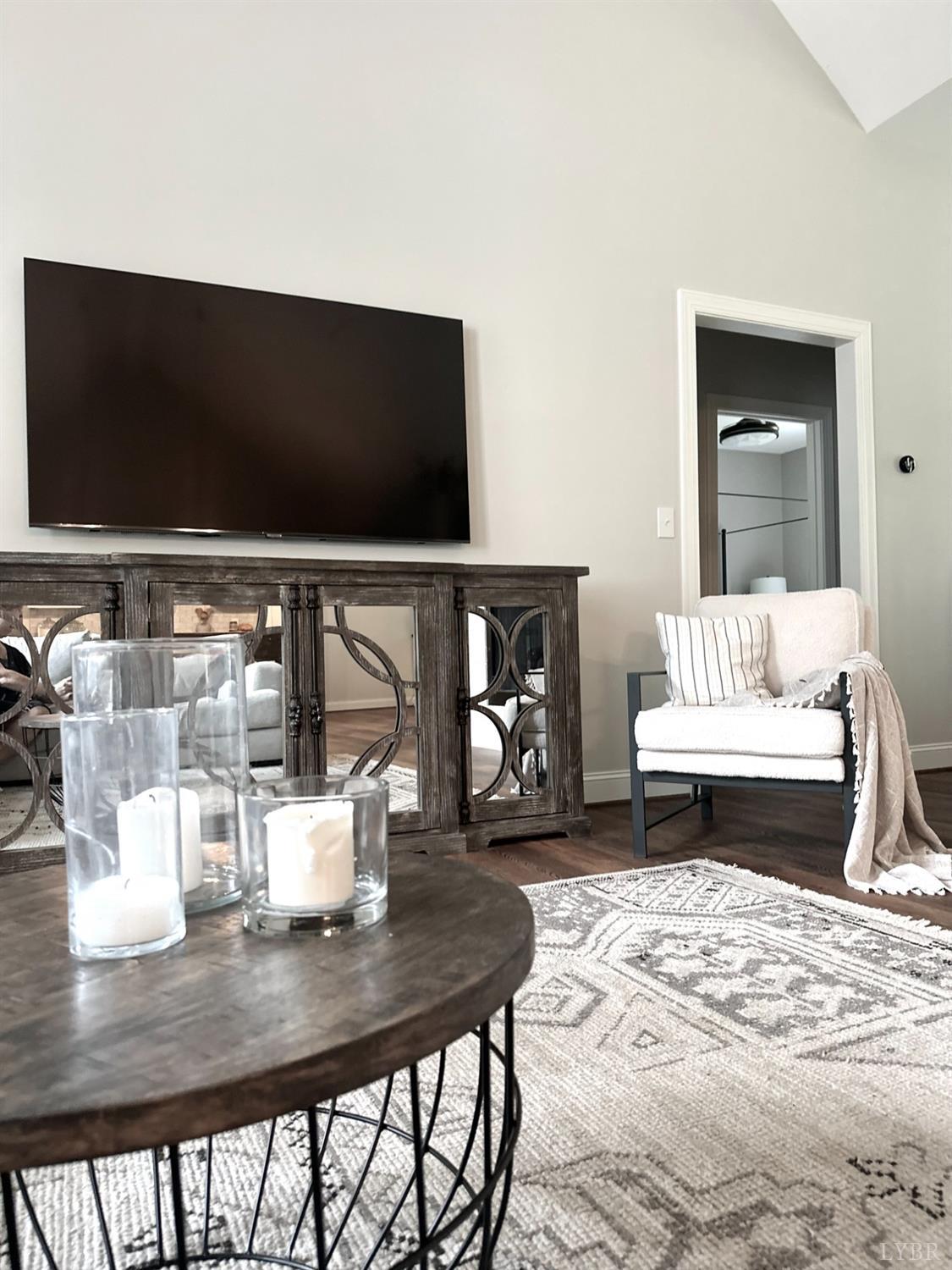 4969 Otterville Road Goode, VA 24556 - Photo 32 of 69 a living room with furniture and a flat screen tv
