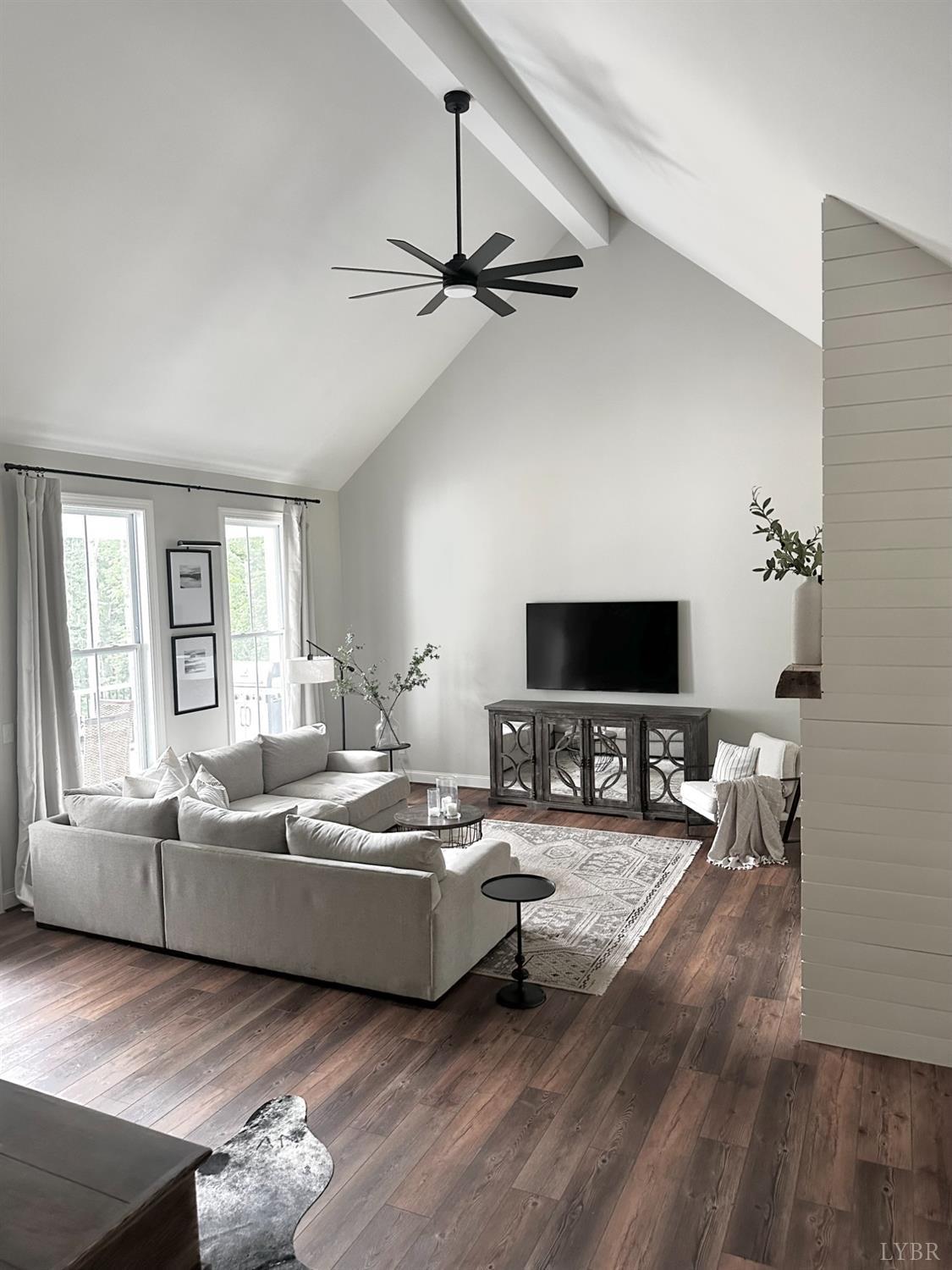 4969 Otterville Road Goode, VA 24556 - Photo 51 of 69 a living room with furniture and a flat screen tv