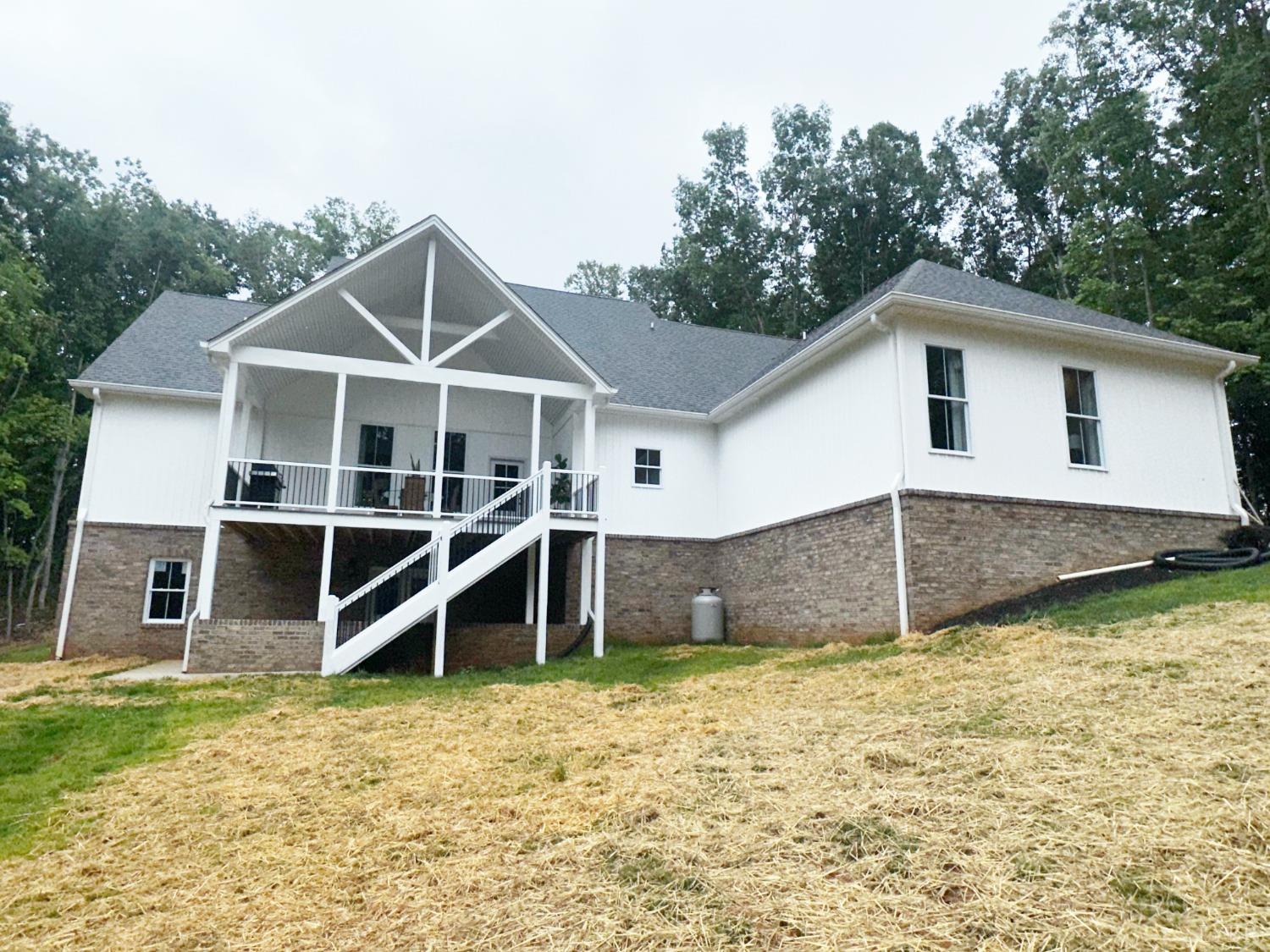 4969 Otterville Road Goode, VA 24556 - Photo 52 of 69 a house with trees in the background