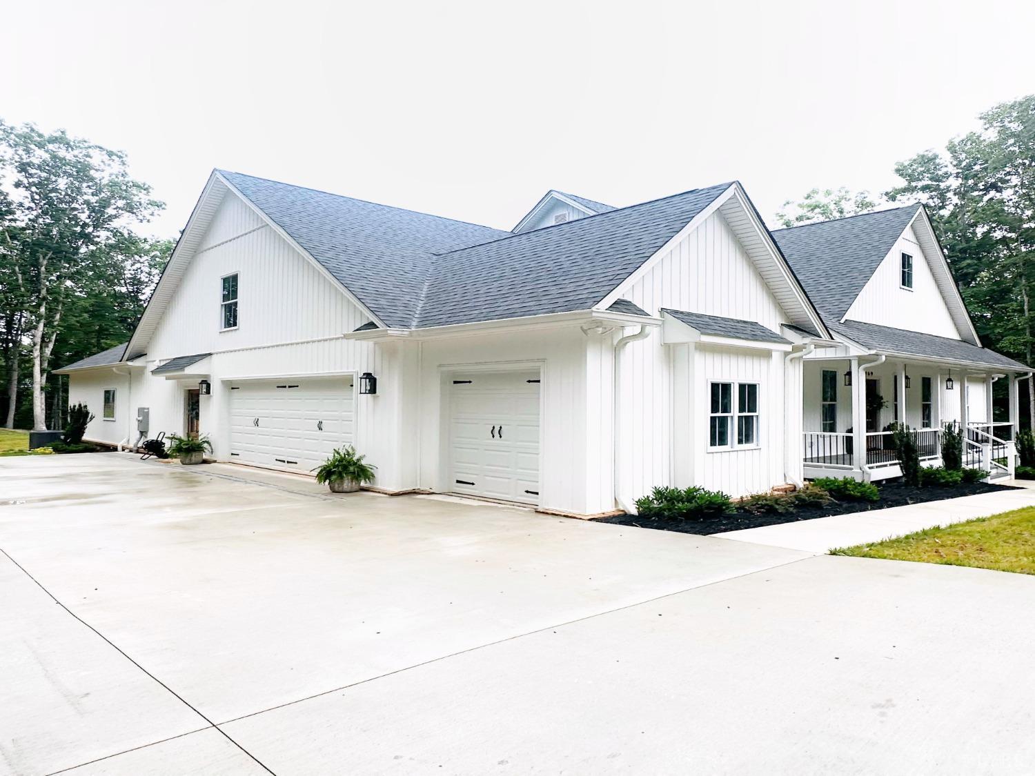 4969 Otterville Road Goode, VA 24556 - Photo 54 of 69 a view of a house with a yard and large tree