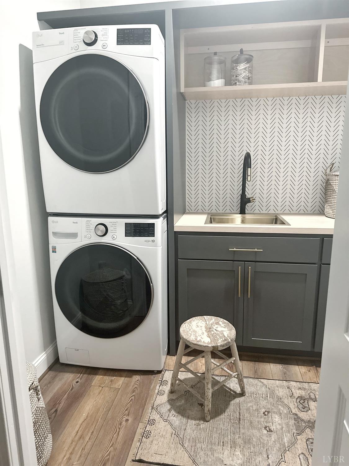 4969 Otterville Road Goode, VA 24556 - Photo 57 of 69 a close view of a utility room with dryer and washer