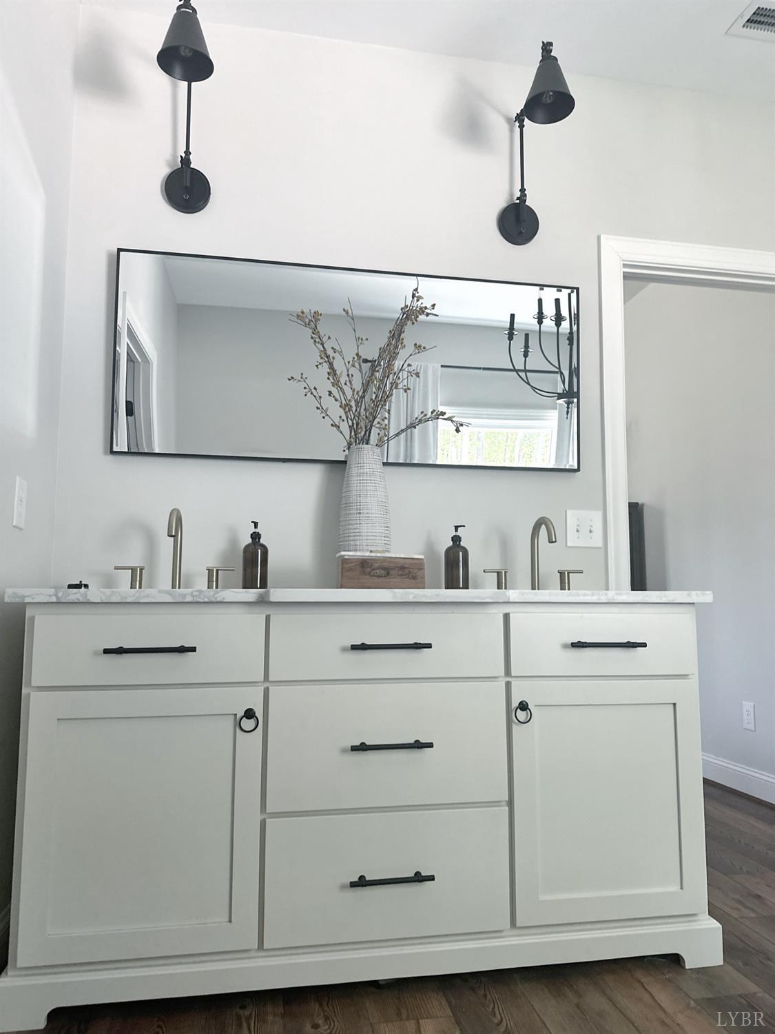 4969 Otterville Road Goode, VA 24556 - Photo 66 of 69 a bathroom with a sink and a mirror