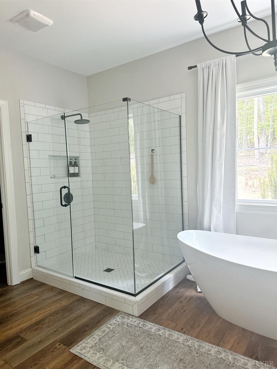 4969 Otterville Road Goode, VA 24556 - Photo 69 of 69 a bathroom with a bathtub and shower