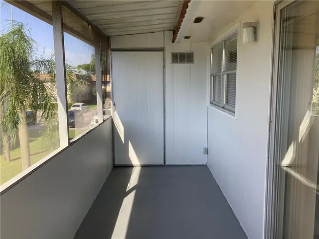a view of swimming pool from a balcony