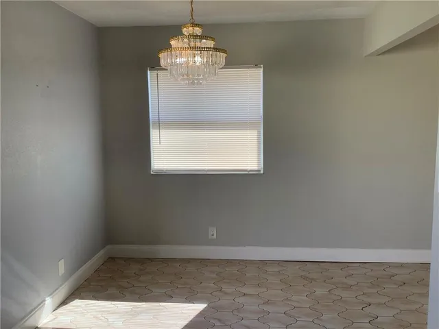 en empty room with a window