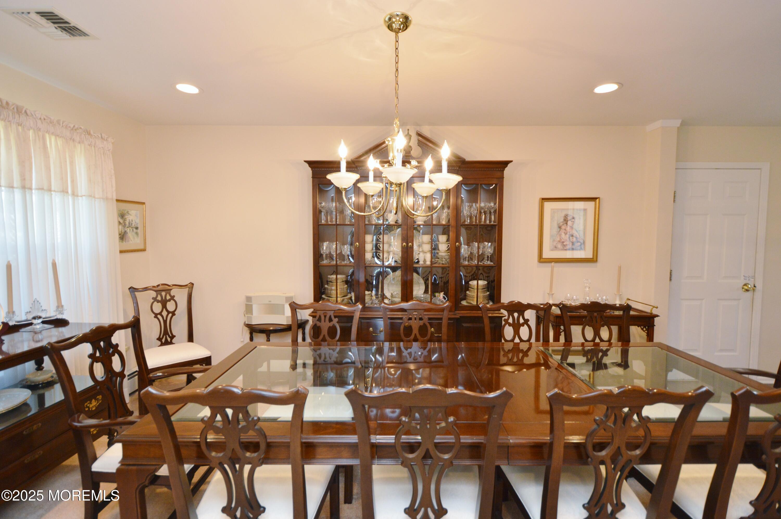 2382 Braddock Road Toms River, NJ 08755 - Photo 12 of 56 a very nice looking dining room with furniture window and wooden floor
