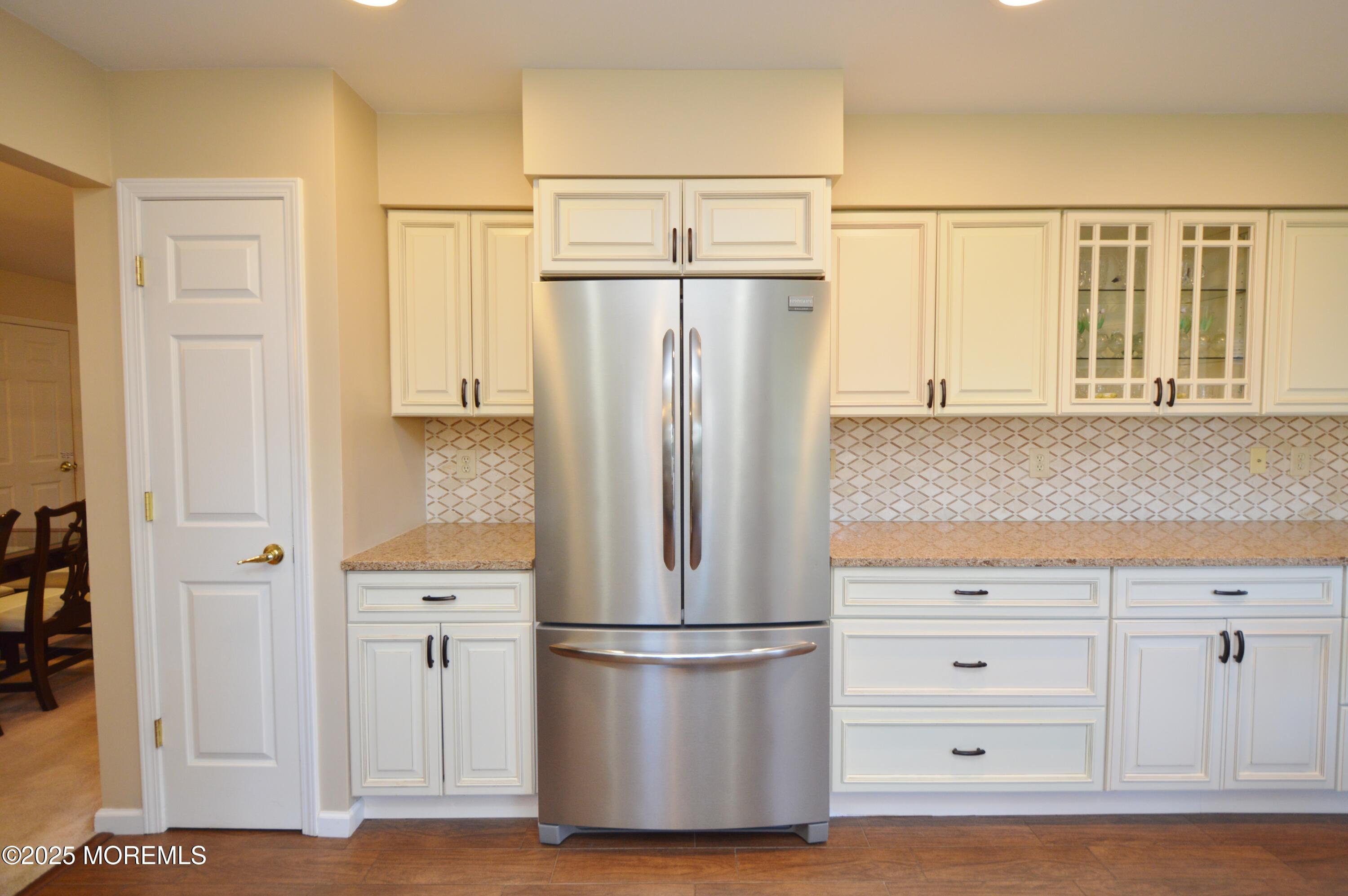 2382 Braddock Road Toms River, NJ 08755 - Photo 20 of 56 a white refrigerator freezer sitting in a kitchen