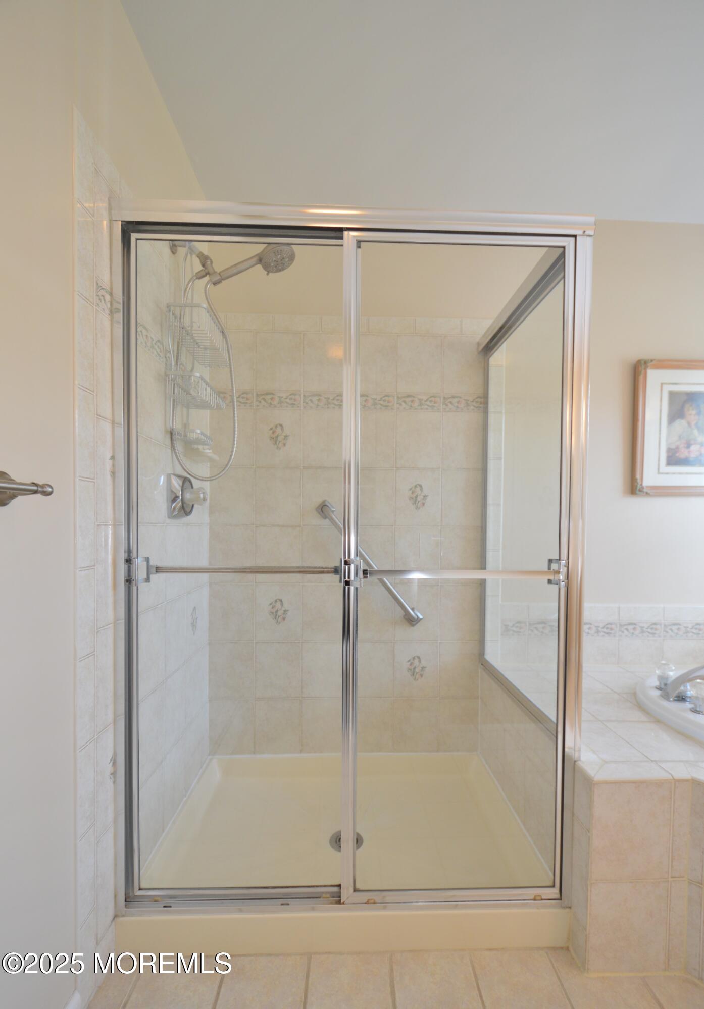 2382 Braddock Road Toms River, NJ 08755 - Photo 35 of 56 a bathroom with a glass shower door
