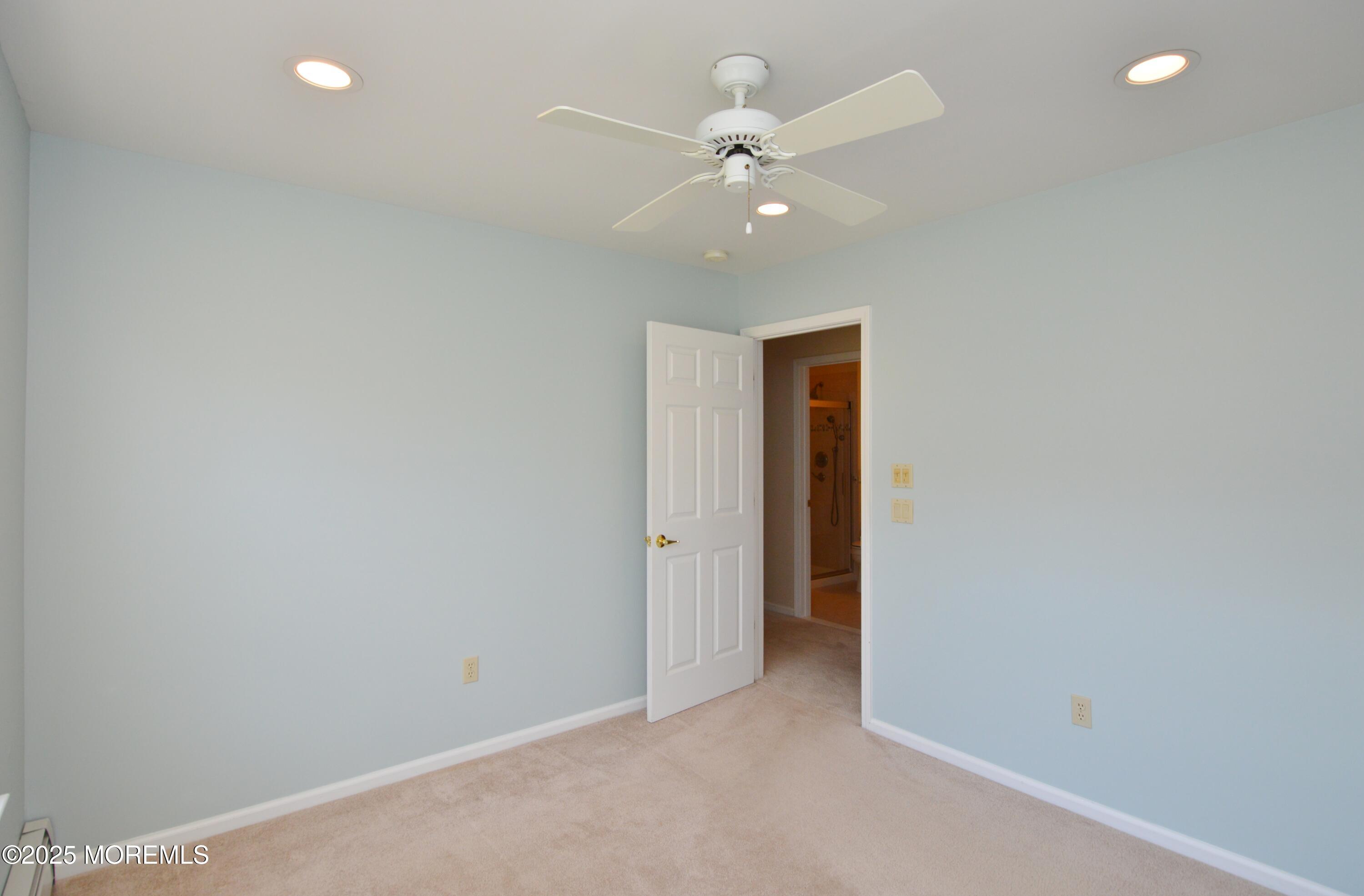 2382 Braddock Road Toms River, NJ 08755 - Photo 39 of 56 an empty room with a fan and a fan