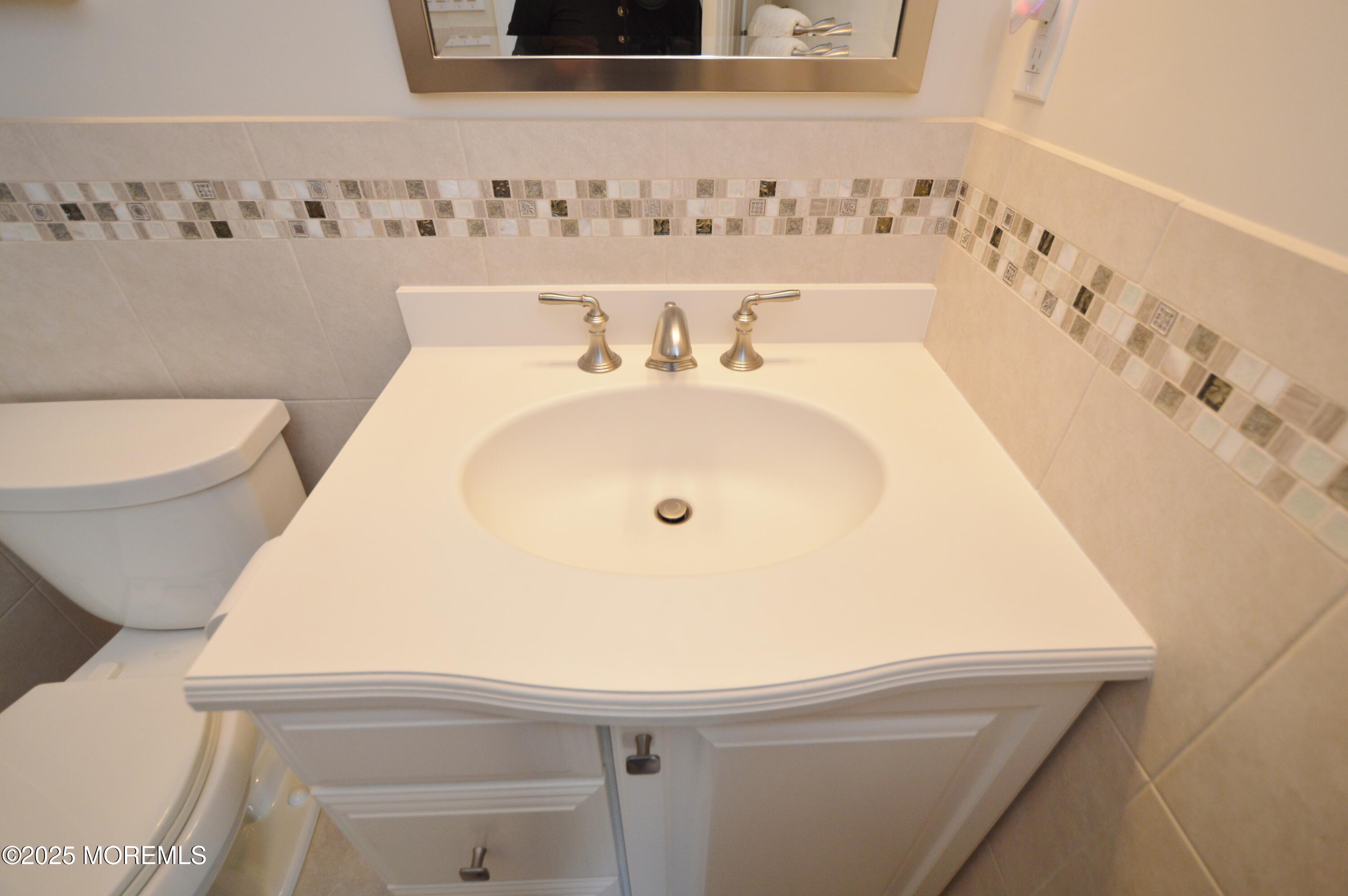 2382 Braddock Road Toms River, NJ 08755 - Photo 41 of 56 a bathroom with a bathtub