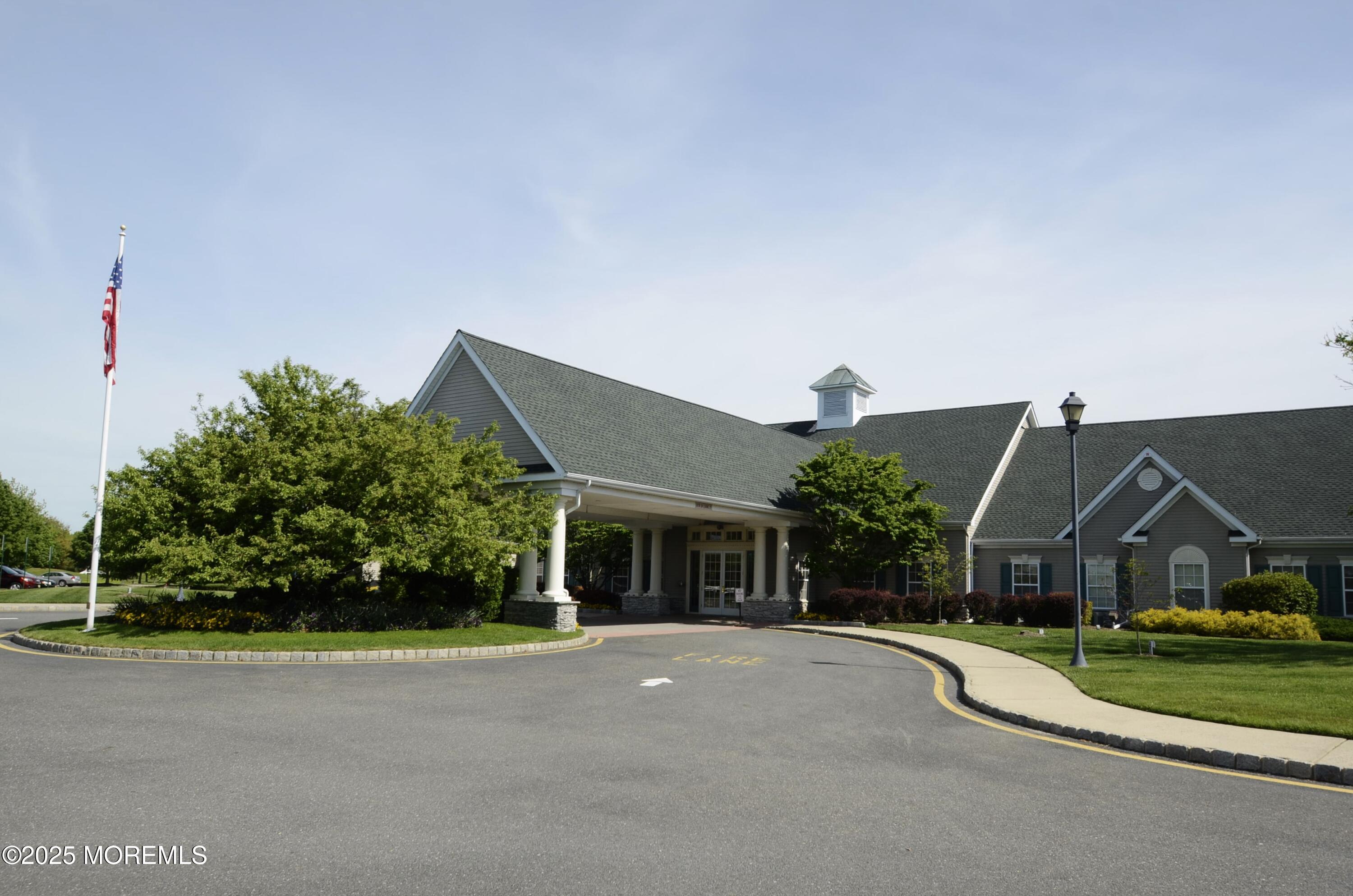 2382 Braddock Road Toms River, NJ 08755 - Photo 49 of 56 a front view of a house with a yard and potted plants