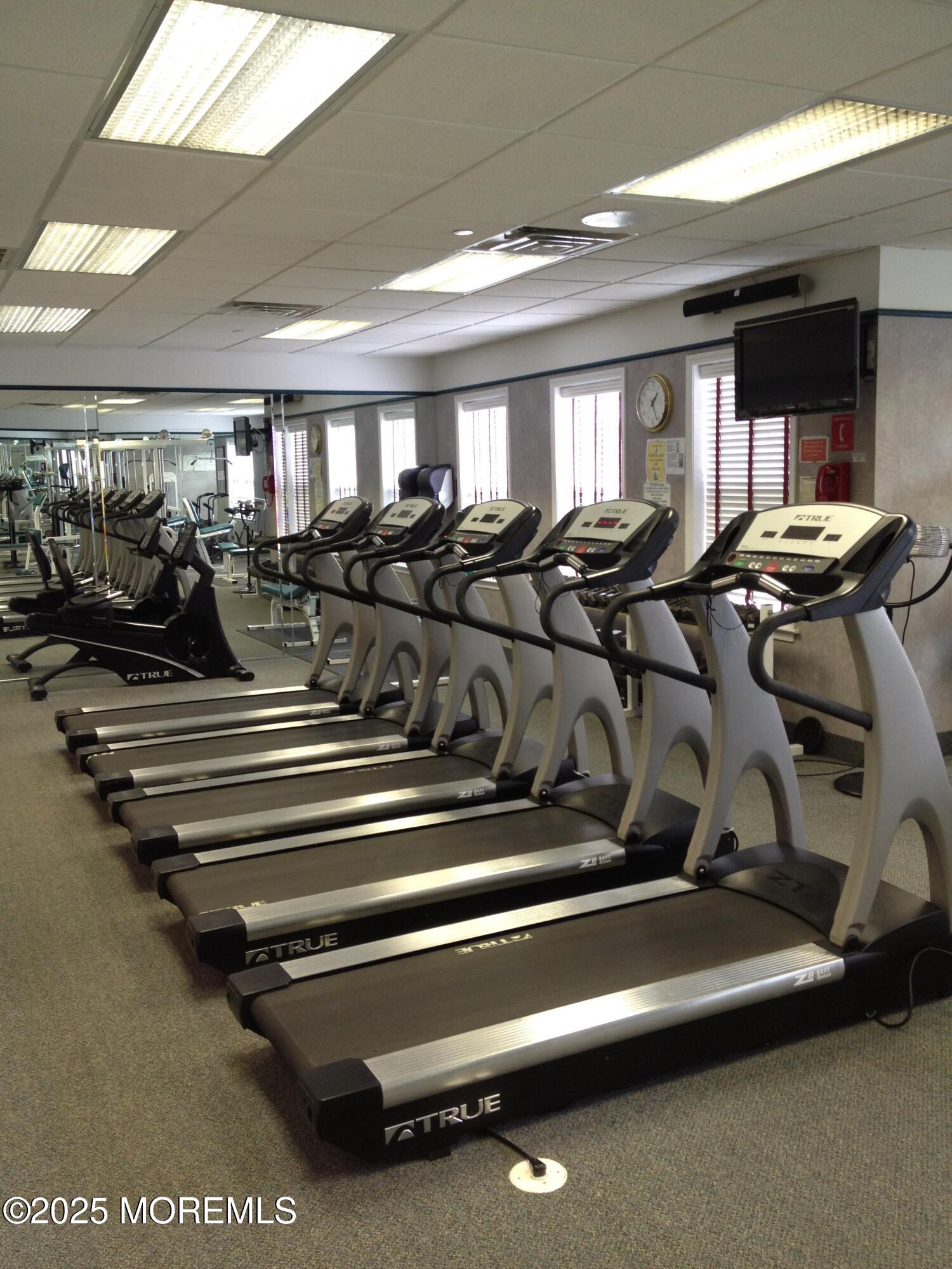 2382 Braddock Road Toms River, NJ 08755 - Photo 52 of 56 a gym room with lots of gym equipment