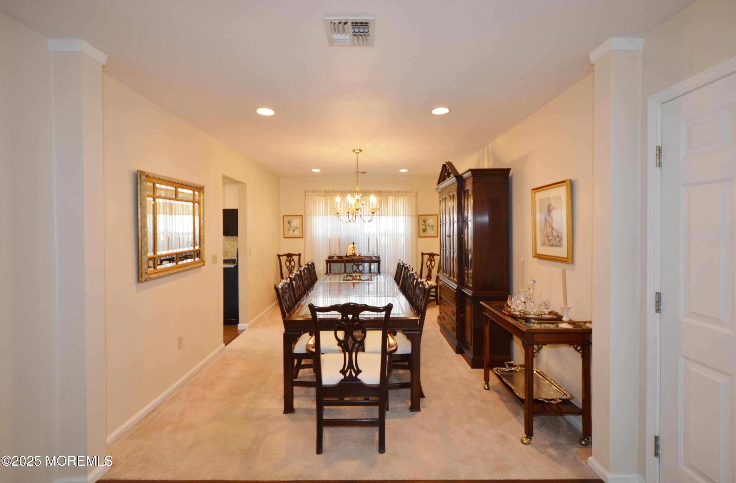 2382 Braddock Road Toms River, NJ 08755 - Photo 10 of 56 a dining room with furniture and a bathroom