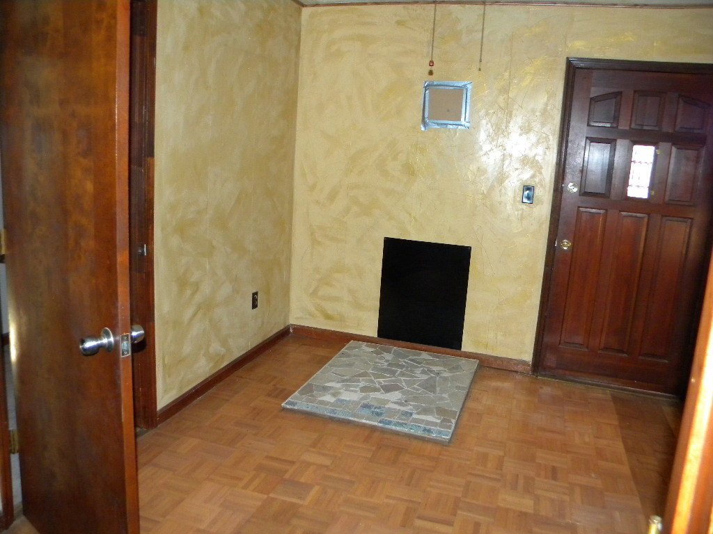 6400 Foxfire Road Catawba, VA 24070 - Photo 8 of 13 view of an empty room with wooden floor and a bathroom