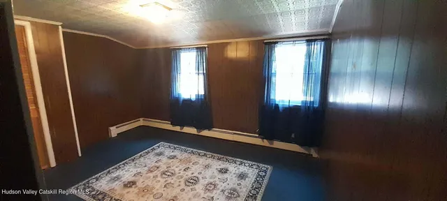 a view of entryway with a front door