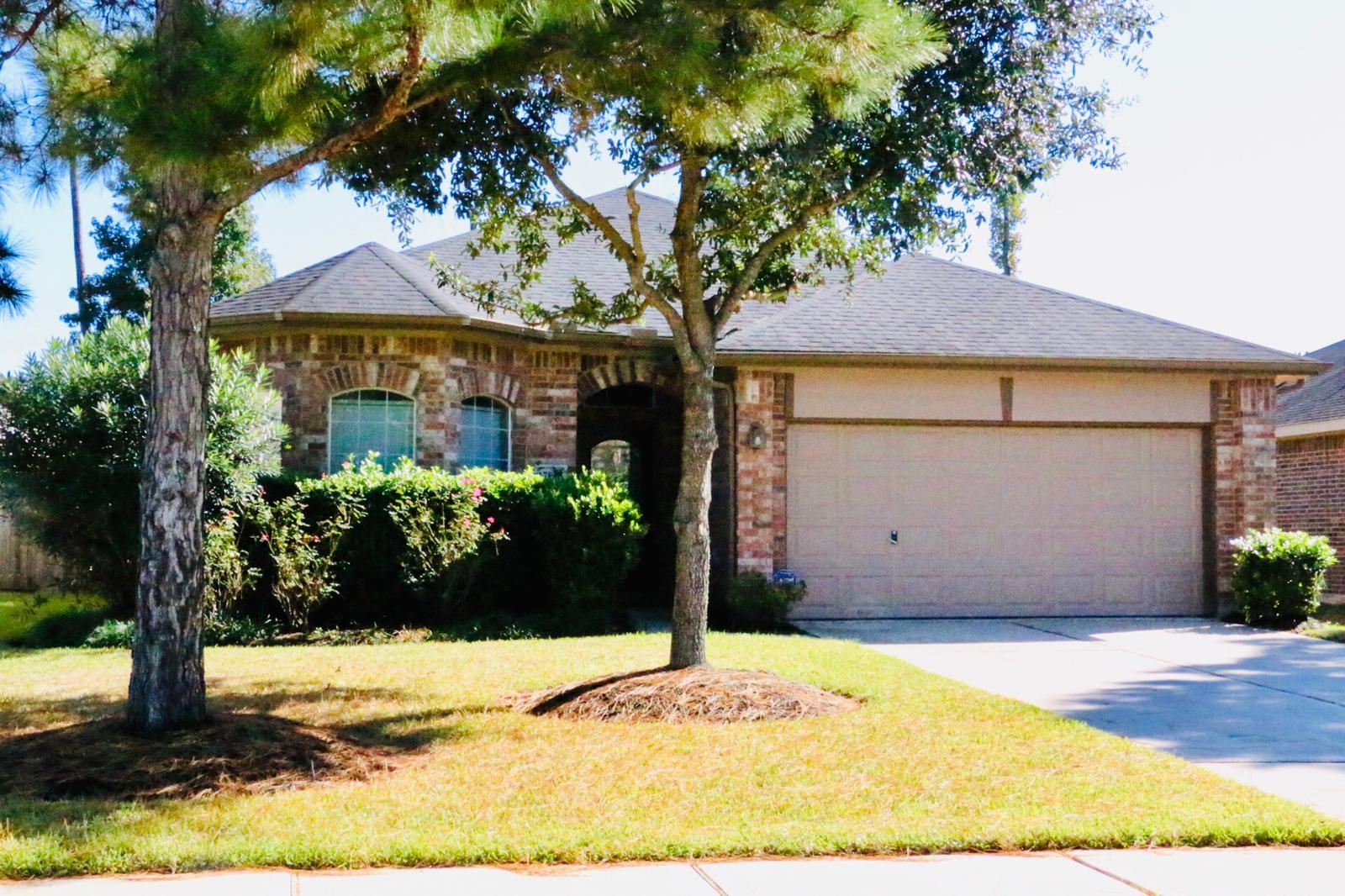 a house with trees in front of it