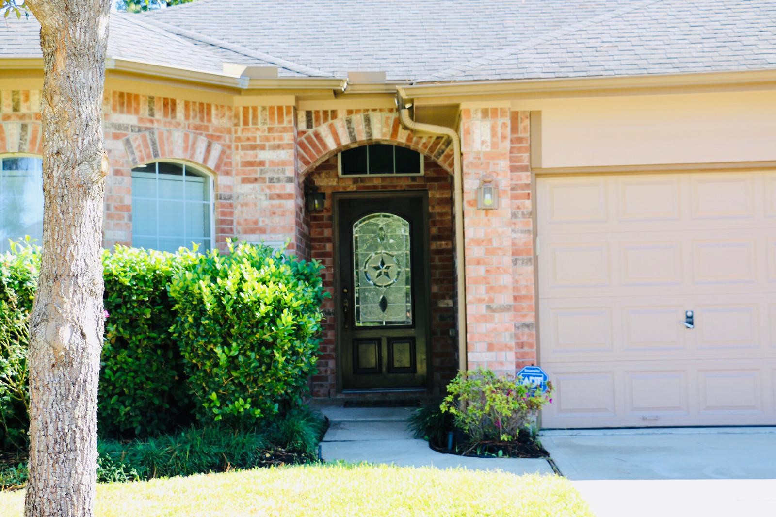 17618 Bryce Manor Lane Humble, TX 77346 - Photo 5 of 14 a front view of a house with garden