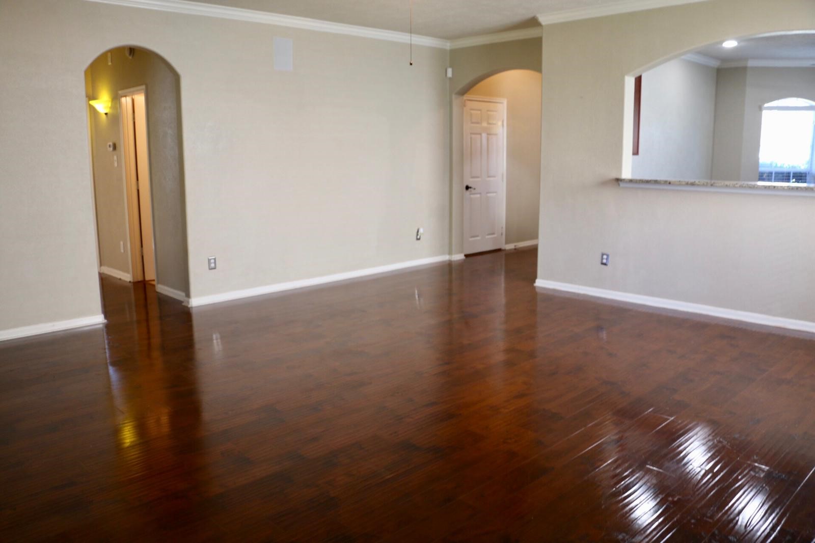 17618 Bryce Manor Lane Humble, TX 77346 - Photo 6 of 14 a view of a room with wooden floor and bathroom view