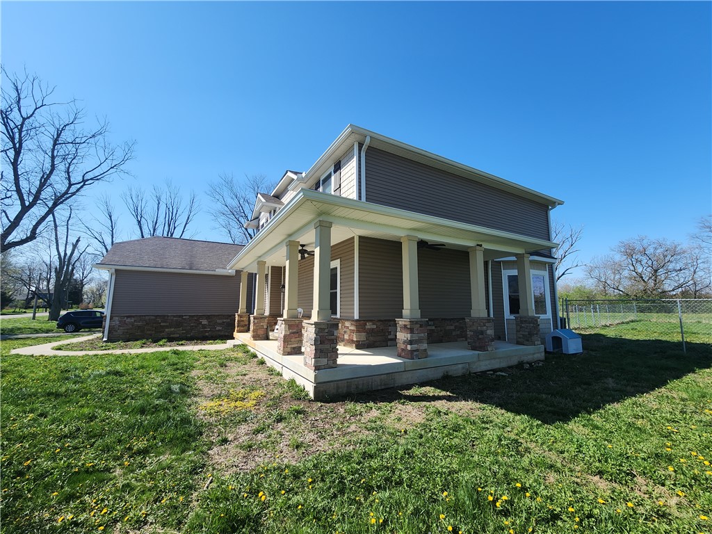 7441 Dodson Road Brookville, OH 45309 - Photo 41 of 50 This residence features a welcoming front porch, perfect for outdoor living and entertaining.