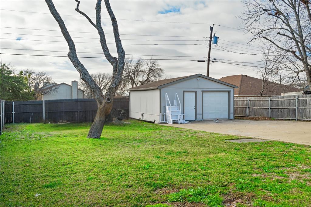 3514 Larry Street Rowlett, TX 75088 - Photo 27 of 27 a front view of a house with garden