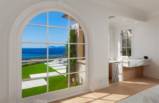 a kitchen with a stove top oven sink and cabinets