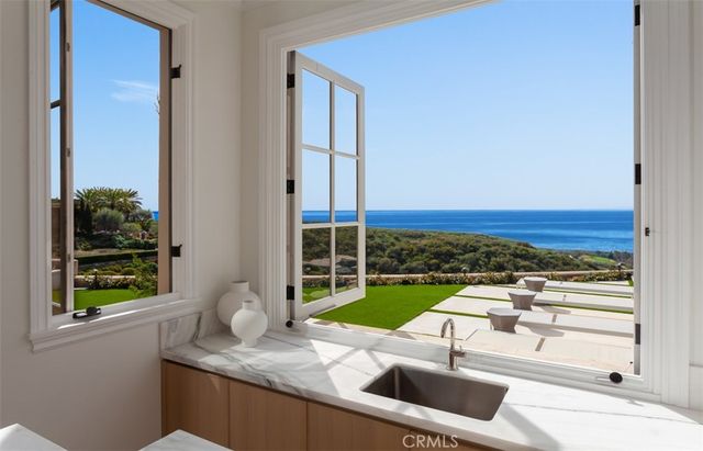 a view of an ocean from a yard