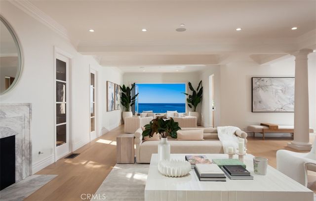 a kitchen with stainless steel appliances granite countertop a stove refrigerator sink and cabinets