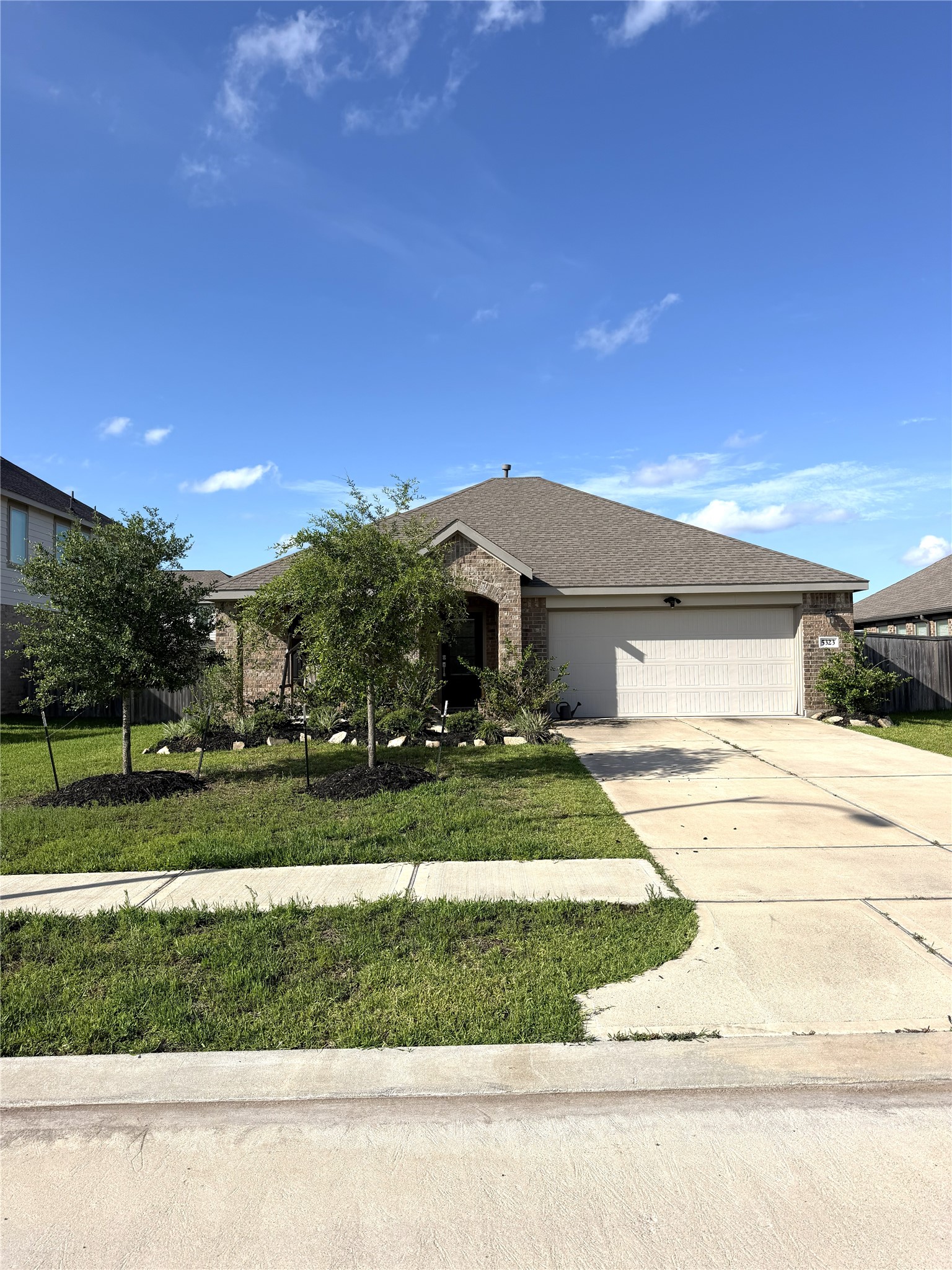 5323 Winding Strm Drive Rosenberg, TX 77469 - Photo 2 of 13 a view of a house with a yard and street