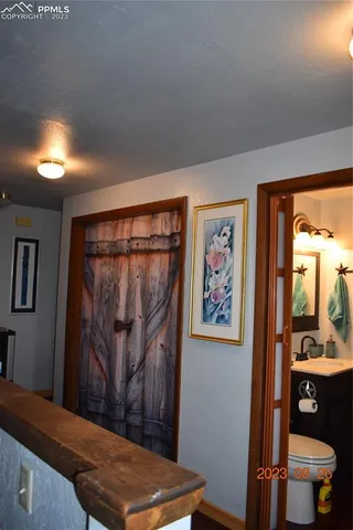 a view of a living room with a window