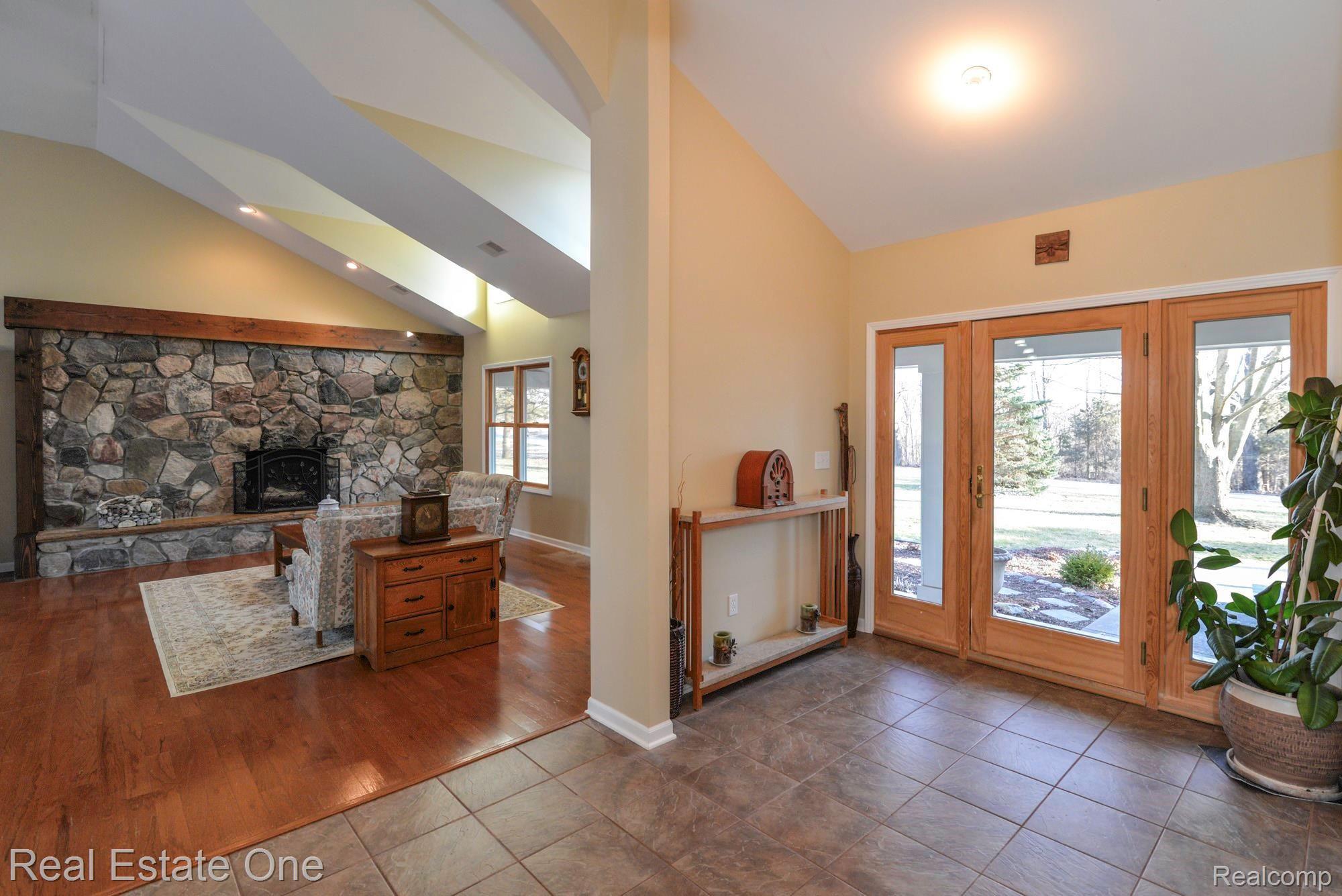 6441 Winans Lake Road Brighton, MI 48116 - Photo 6 of 45 Foyer ~ Great Room