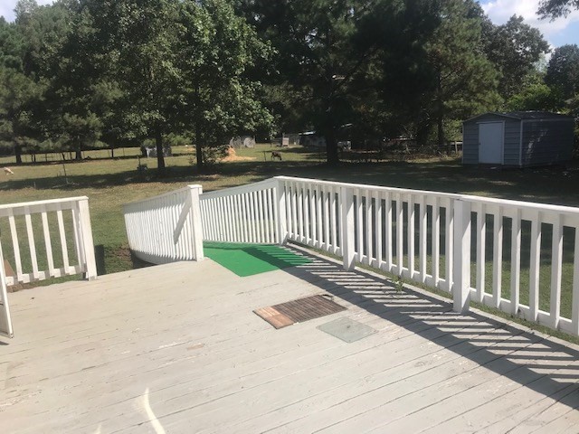 771 Hyde Road Northwest Resaca, GA 30735 - Photo 23 of 27 a view of deck and wooden floor