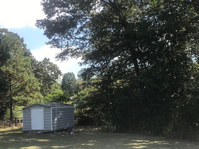 771 Hyde Road Northwest Resaca, GA 30735 - Photo 24 of 27 a view of a house with a tree