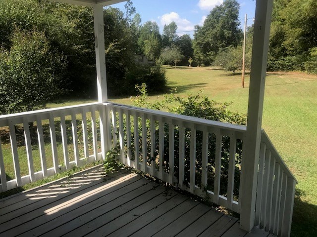 771 Hyde Road Northwest Resaca, GA 30735 - Photo 3 of 27 a view of a wooden balcony