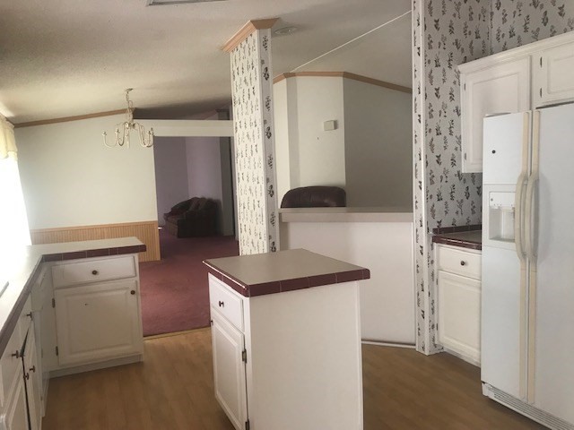 771 Hyde Road Northwest Resaca, GA 30735 - Photo 10 of 27 a kitchen with a refrigerator and a sink