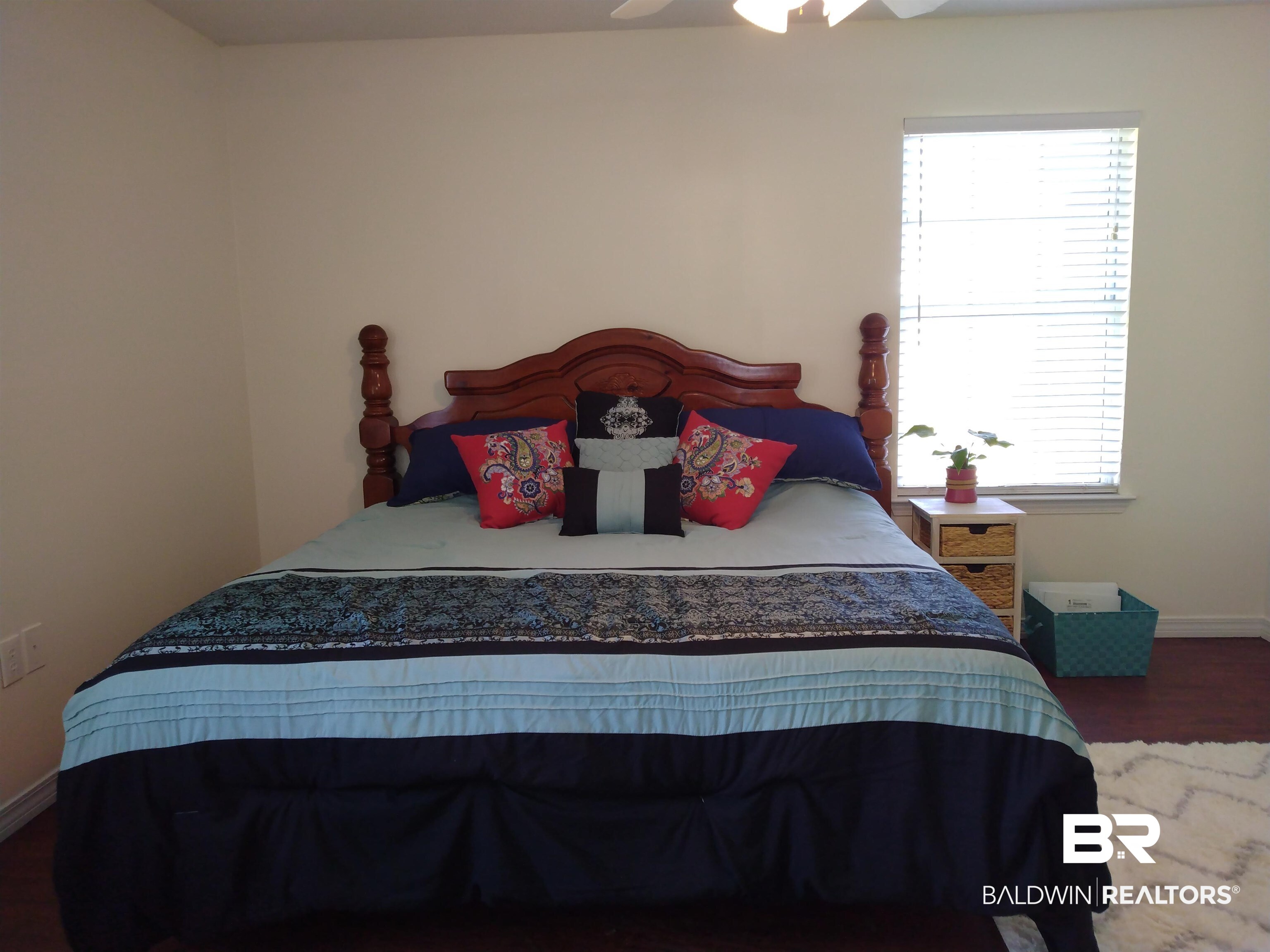 431 Hamilton Boulevard Foley, AL 36535 - Photo 9 of 30 Bedroom with dark wood-type flooring, ceiling fan, and multiple windows