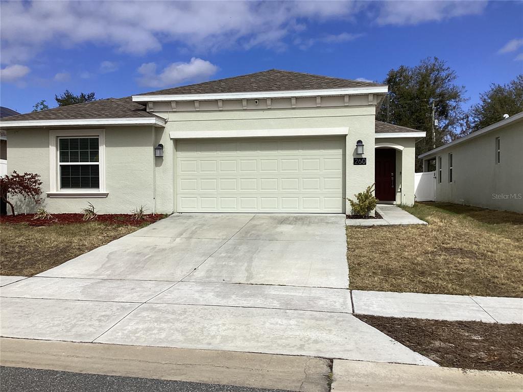 a view of a house with a patio