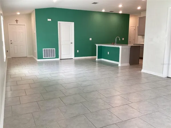a bathroom with a shower and a sink