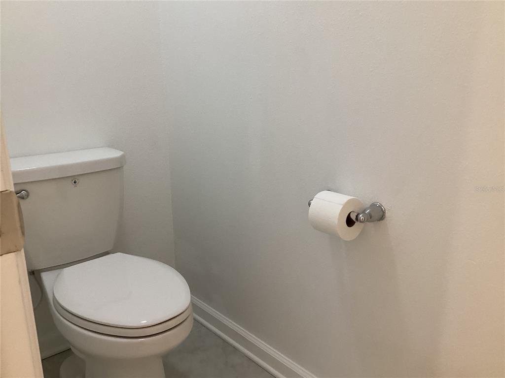 260 Pershing Street Bartow, FL 33830 - Photo 39 of 89 a white toilet sitting next to a white wall