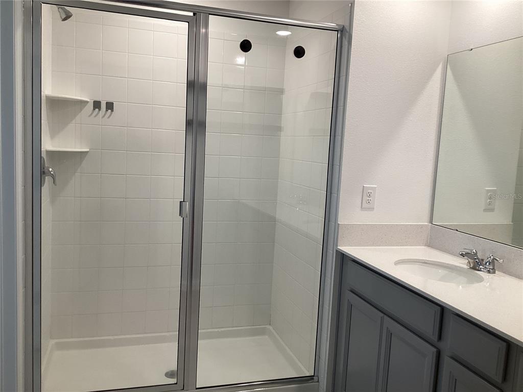 260 Pershing Street Bartow, FL 33830 - Photo 43 of 89 a bathroom with a shower and a sink