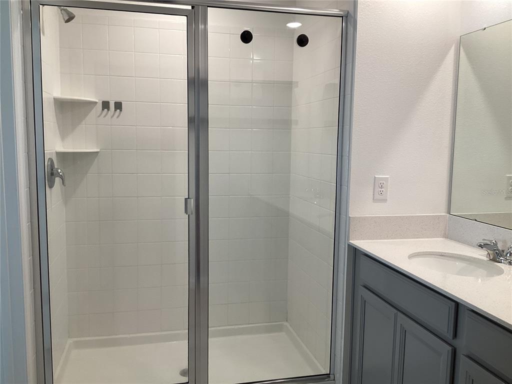 260 Pershing Street Bartow, FL 33830 - Photo 46 of 89 a bathroom with a shower and a sink