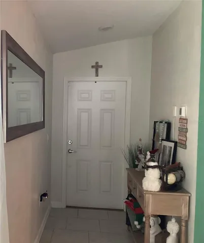 a room with furniture and air hockey table