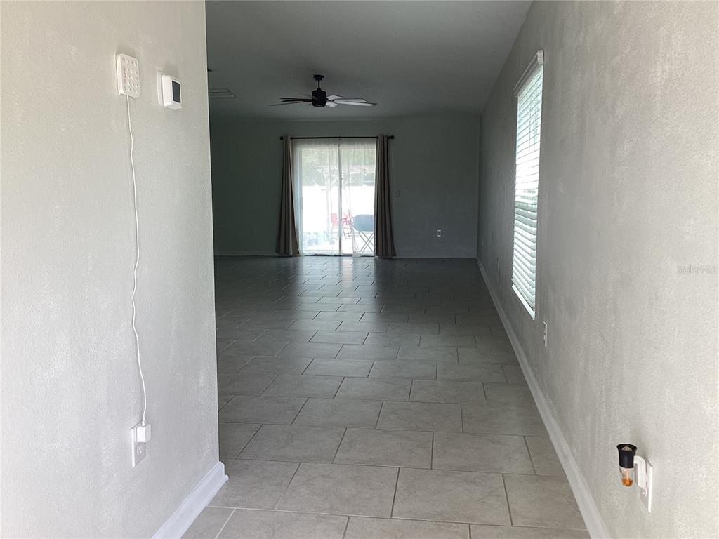 260 Pershing Street Bartow, FL 33830 - Photo 5 of 89 a view of livingroom with hardwood floor and window
