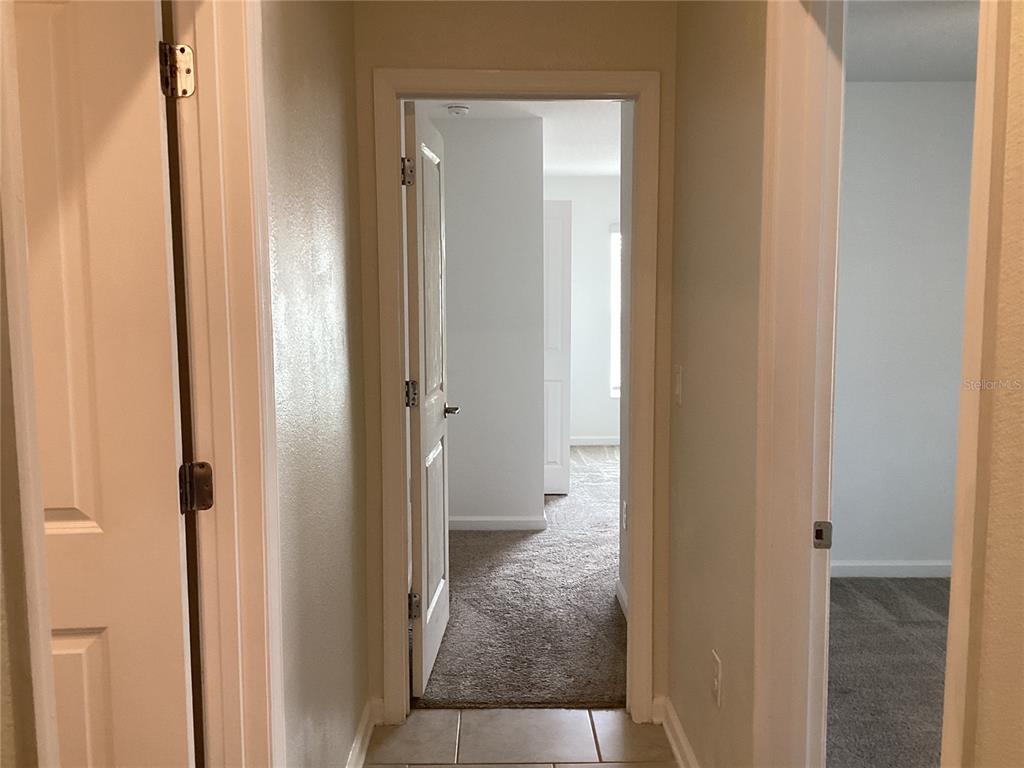 260 Pershing Street Bartow, FL 33830 - Photo 56 of 89 a view of a bathroom from a hallway