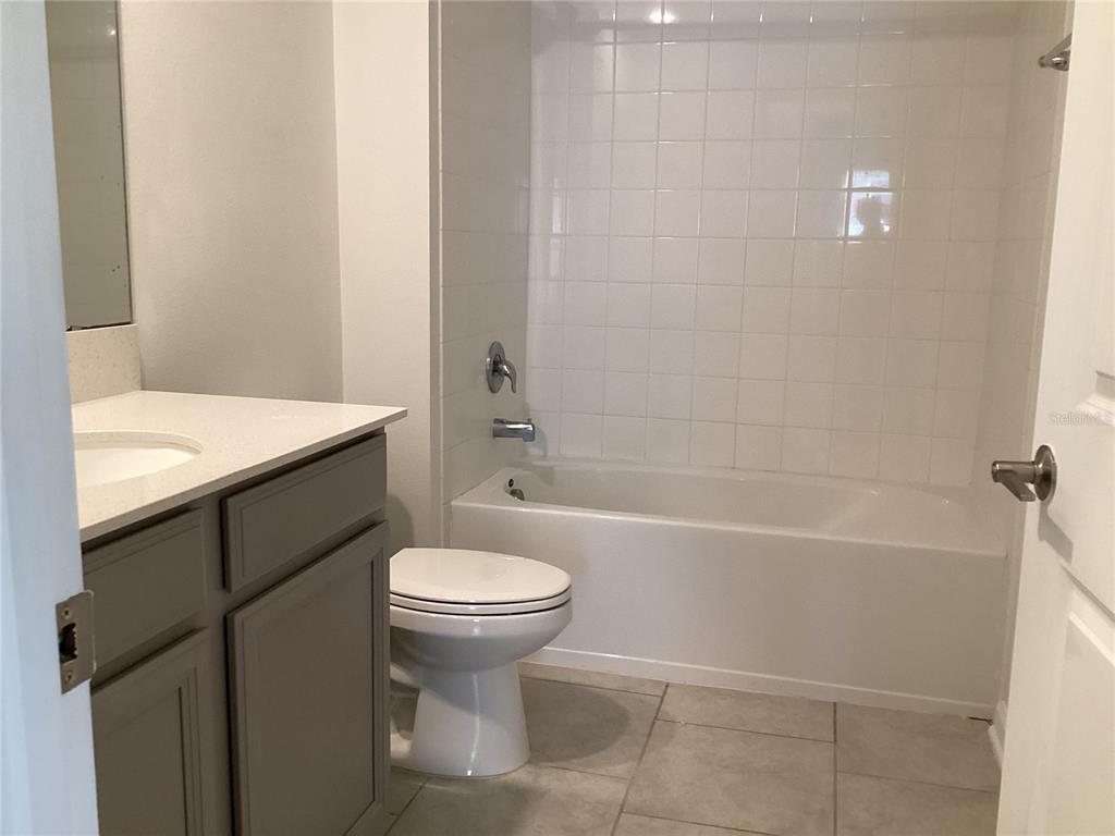 260 Pershing Street Bartow, FL 33830 - Photo 66 of 89 a bathroom with a sink a toilet and bathtub